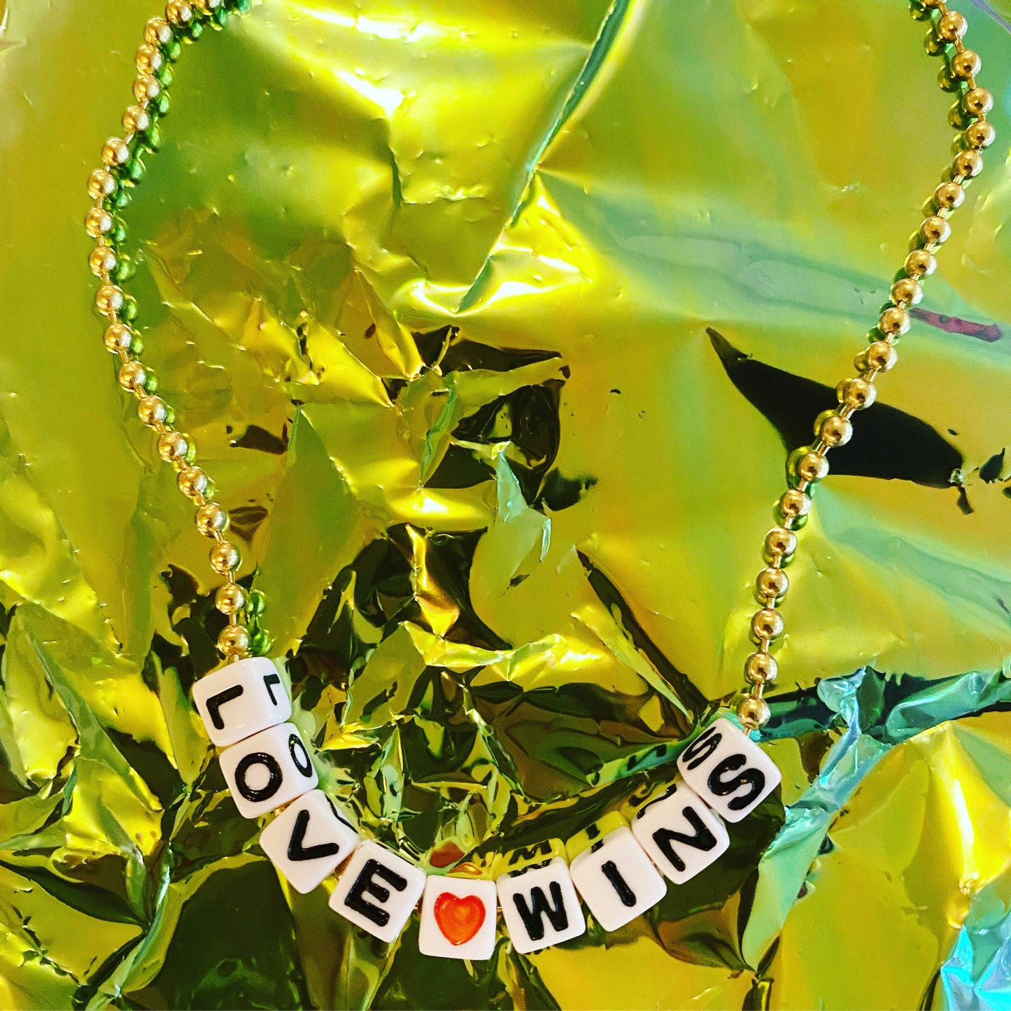 "Love Wins" Necklace by Gunner & Lux