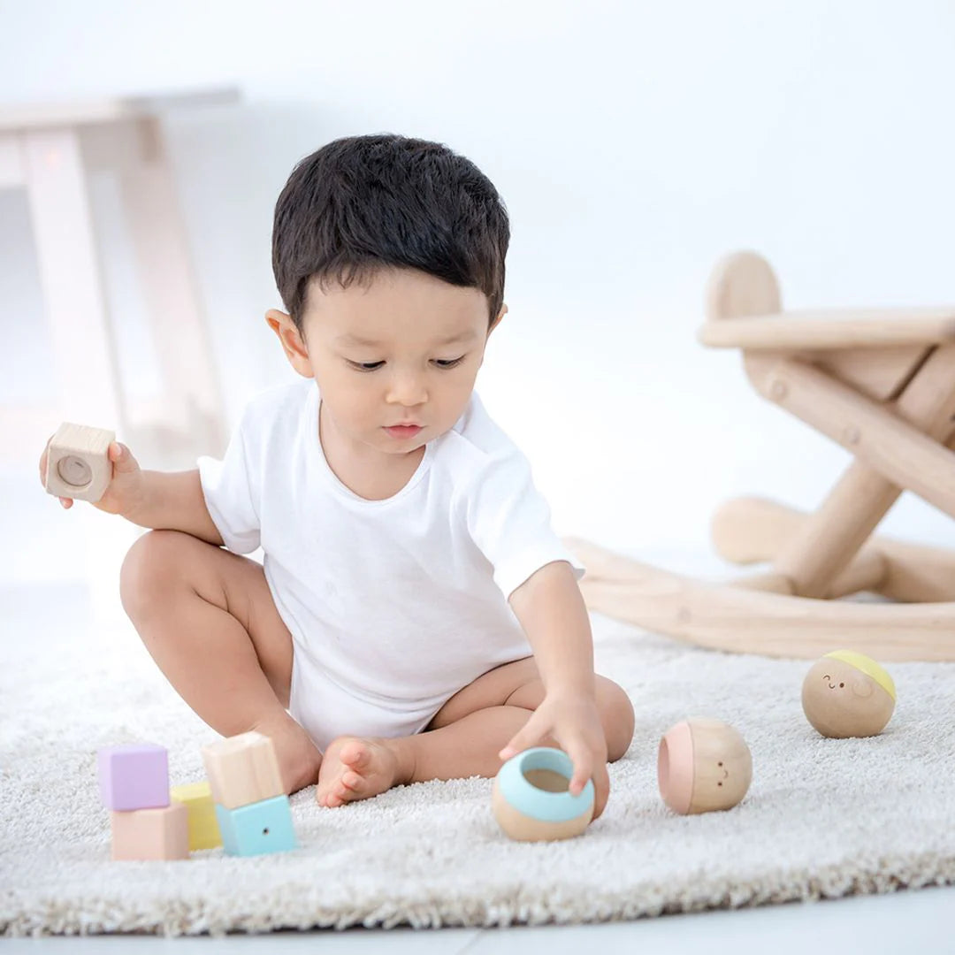 Pastel Sensory Tumbling Toys by Plan Toys