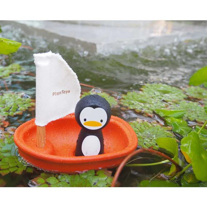 Penguin in Sailing Boat by Plan Toys
