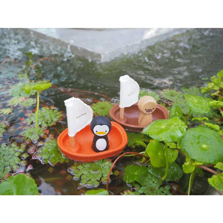 Penguin in Sailing Boat by Plan Toys