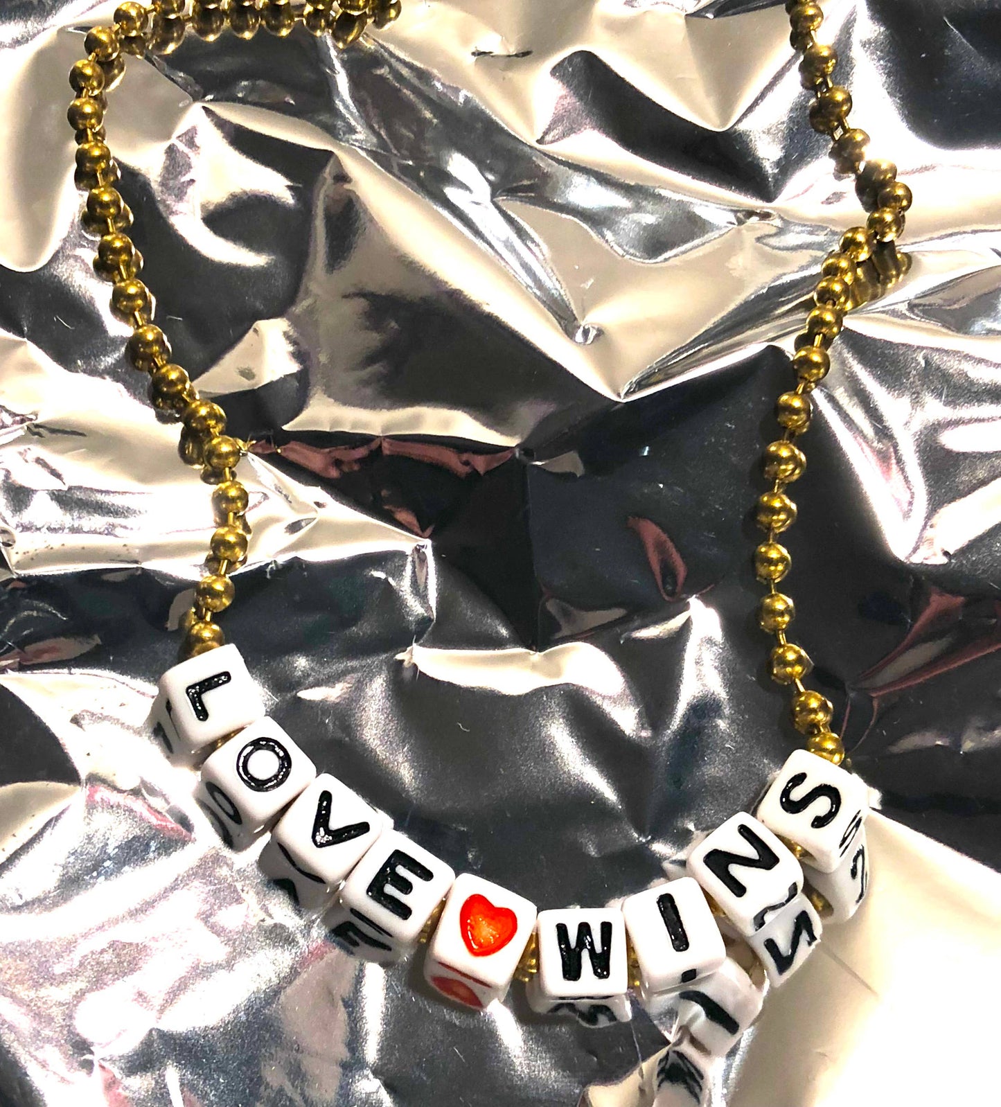 "Love Wins" Necklace by Gunner & Lux